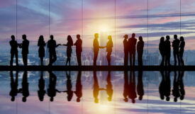 Business people silhouettes in a conference room. 